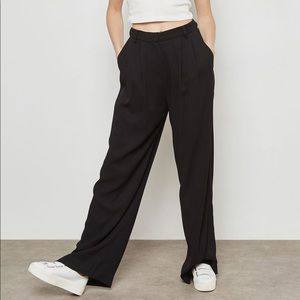 MANGO. Black wide leg trousers. High waist.